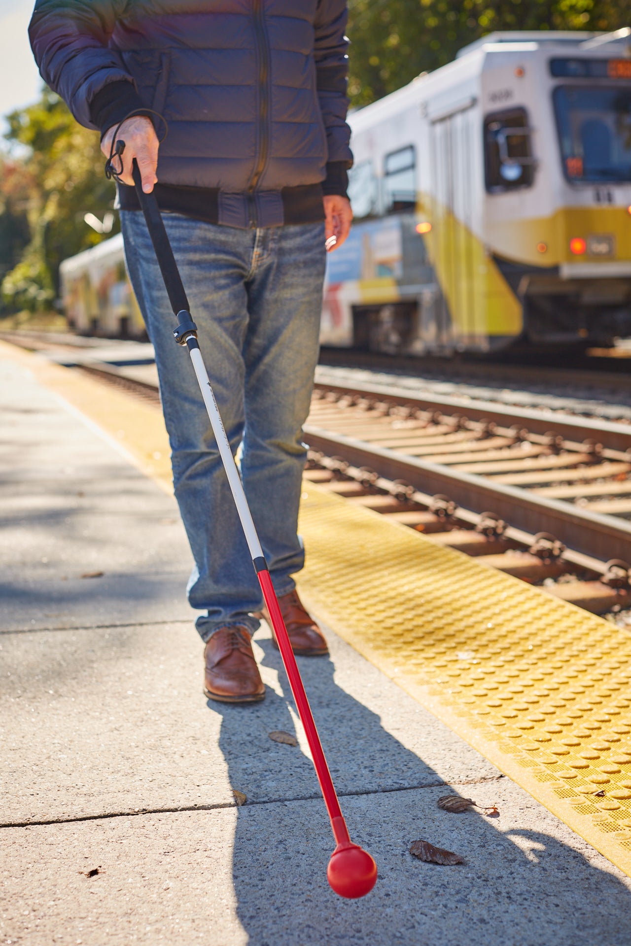 Image of the Awarewolf Gear All Terrain Cane being used over rough terrain.