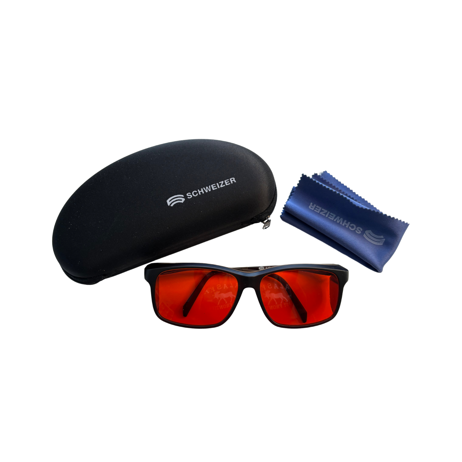 Image of the Schweizer's FC3 wrap-around glasses with brown frames and dark orange tint with included microfiber cloth and protective case.