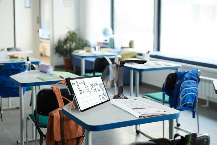 Image of the Surface Pro 9 and the Solo 8+ camera in a classroom and the prodigi software on the tablet screen.