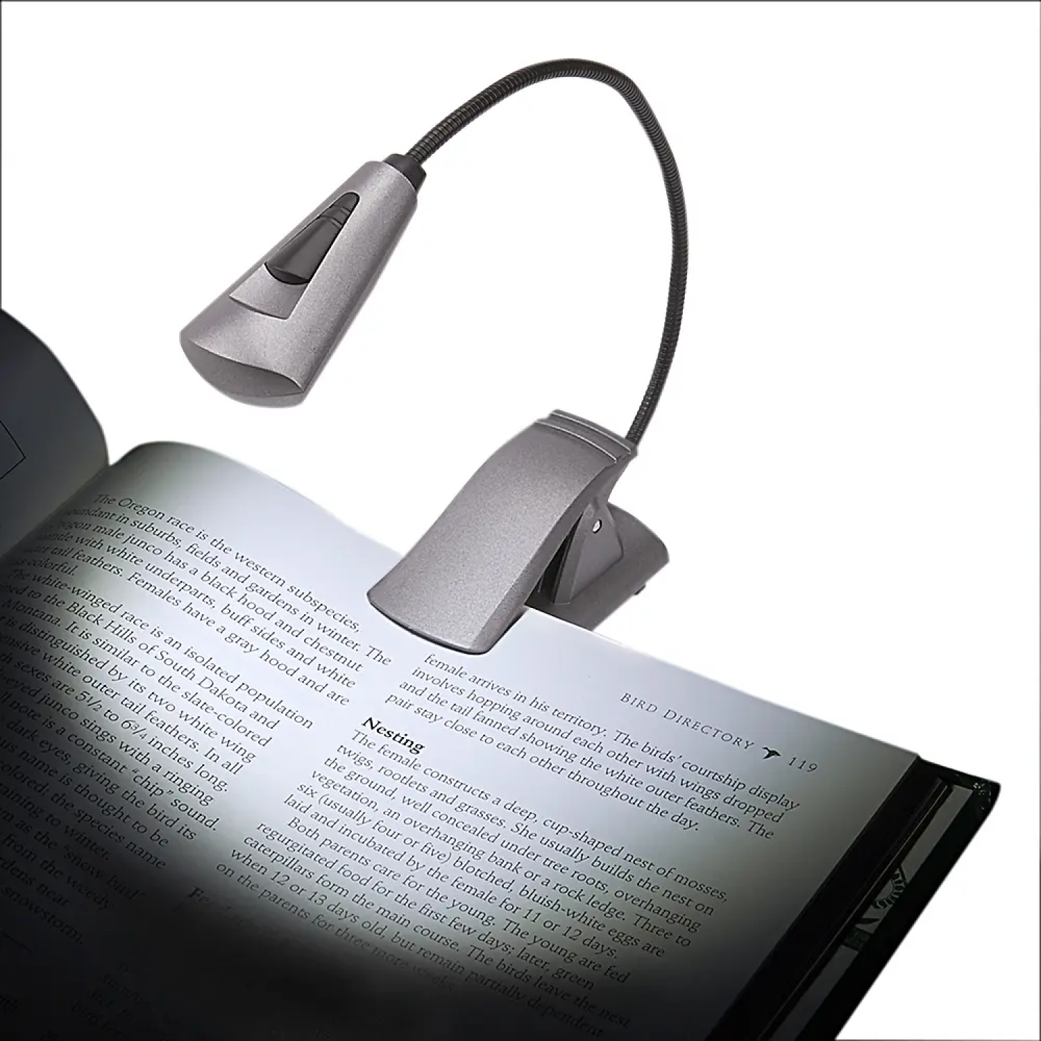 Image of reading a book while using the FlexNeck Plus Ultra-Bright 6 LED Book Light.